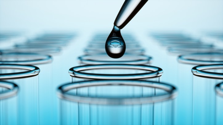 Dripping water into test tube to test sample through ASTM D4840 sample chain-of-custody procedures.