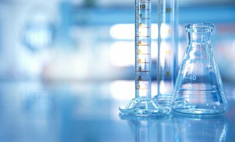 Three beakers that can yield different measurements, showing the importance of labs reporting measurement uncertainty.