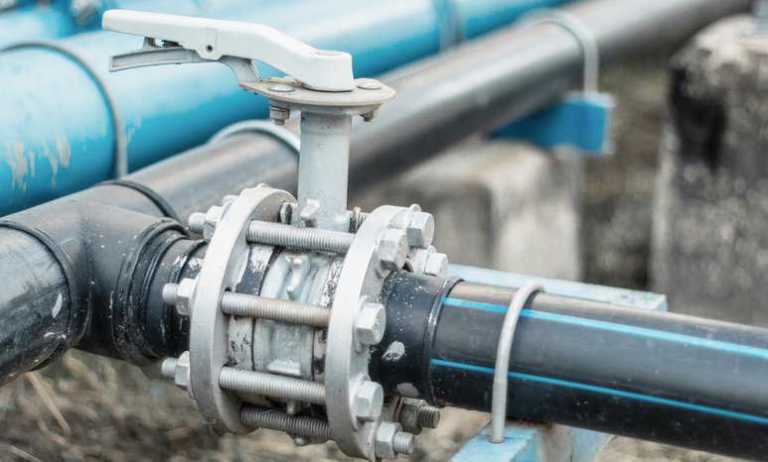 An outside blue butterfly valve made to the MSS SP-67-2022 standard.