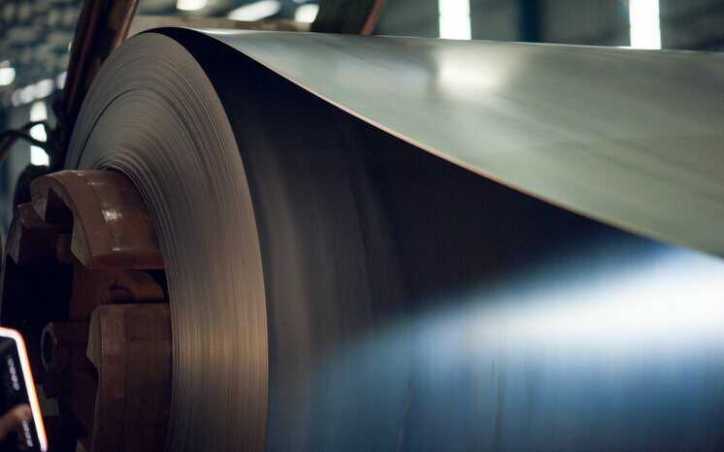 Metal roll that resembles tape used during the ASTM D3359-22 crosshatch and X cut test for measuring adhesion.