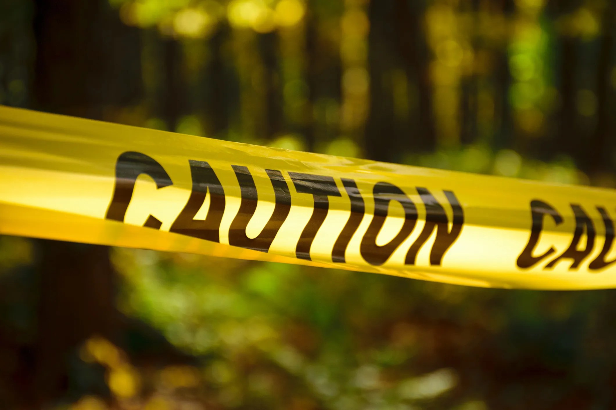 ANSI Z535.5-2022 compliant barricade tape displaying the signal word CAUTION with standardized color codes for temporary hazards.