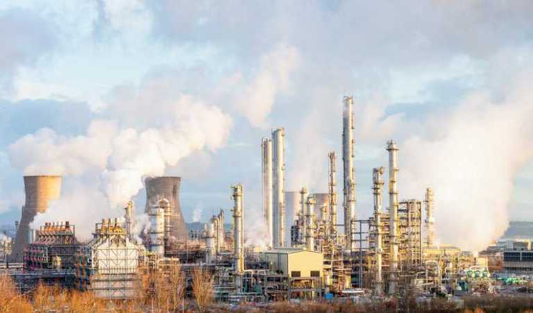 Steel exhaust stacks at a construction site adhering to ASME STS-1-2021 design controls.