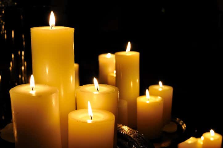 Candles adhering to fire safety labeling requirements in ASTM F2058-07(2021).