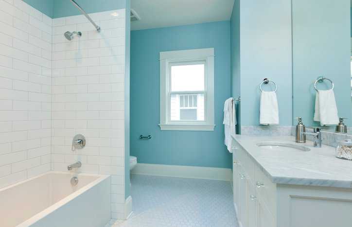 Blue bathroom with plastic plumbing fixtures that follow the requirements of CSA B45.5-22/IAMPO Z124.