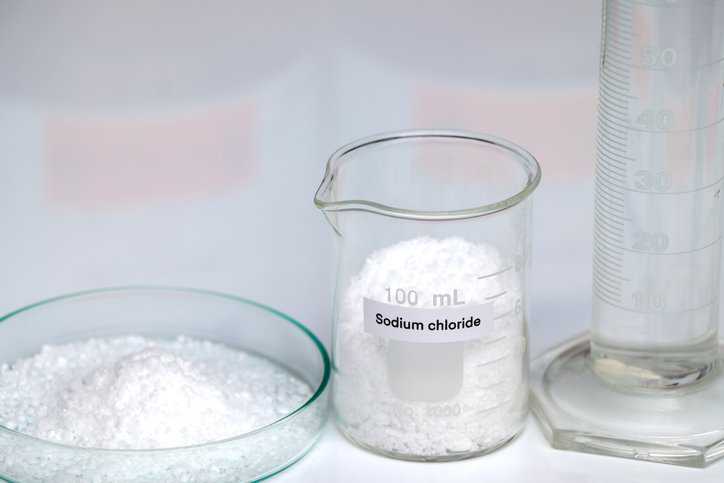 Salt spray testing getting set up in a laboratory adhering to ISO 9227:2022.