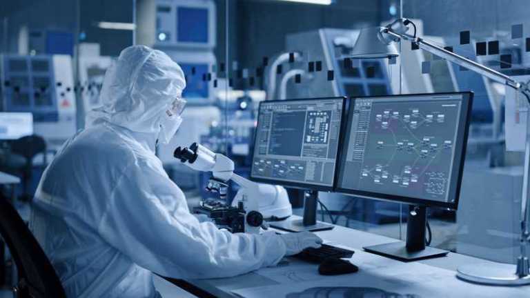 Electronics factory cleanroom adhering to performance and clean airflow requirements in ISO 14644-4:2022.