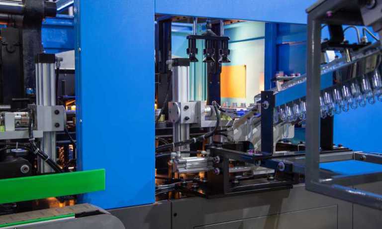 Process of PET plastic bottling on bottle blowing machine pre-heat process adhering to ANSI/PLASTICS B151.31-2014 (R2020).