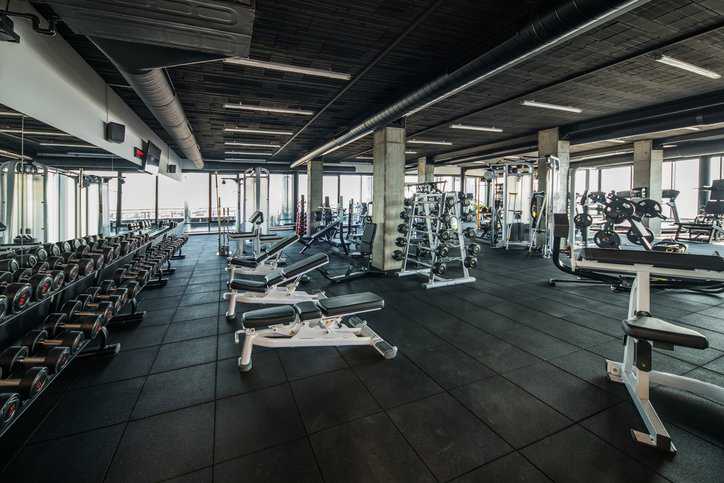 Safety signage and labels for fitness equipment that adhere to ASTM F1749-15(2020).