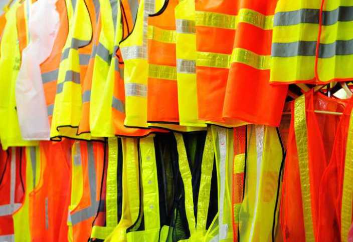 Collection of reflective and florescent orange and yellow high-visibility safety vests that adhere to CSA Z96-15 (R2020).