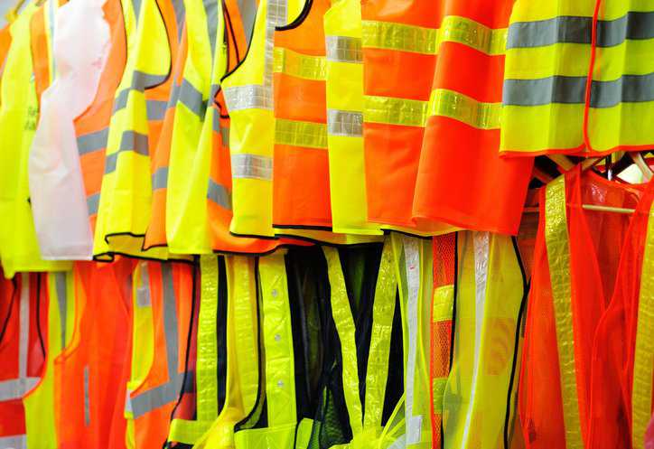 Collection of reflective and florescent orange and yellow high-visibility safety vests that adhere to CSA Z96-15 (R2020).