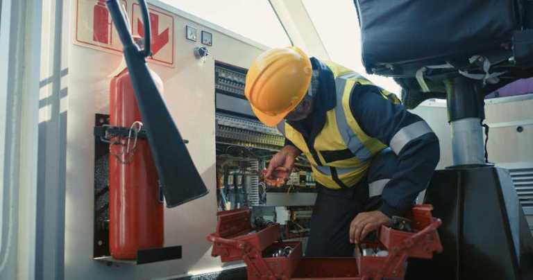 Electric technician adhering to NFPA 790-2024 and NFPA 791-2024 field evaluation requirements.
