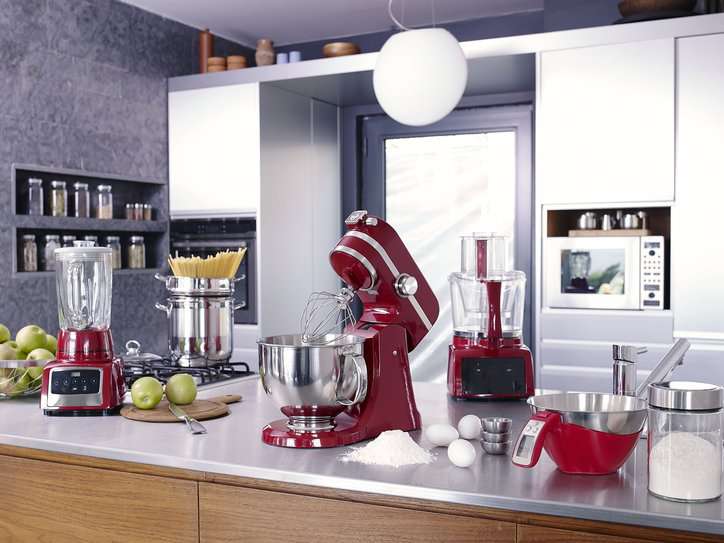 Household kitchen interior with electrical cooking appliances adhering to IEC 60335-2-14:2016.