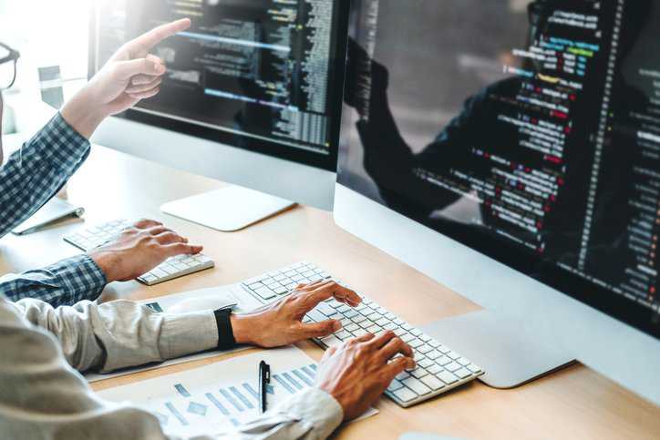Software engineers developing Website design and coding technologies that adhere to ISO/IEC/IEEE 23026:2023.