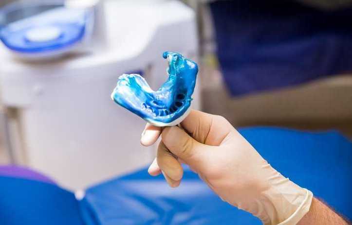 Dental hydrocolloid impression of a patient's bite adhering to ANSI/ADA 128-2022 .