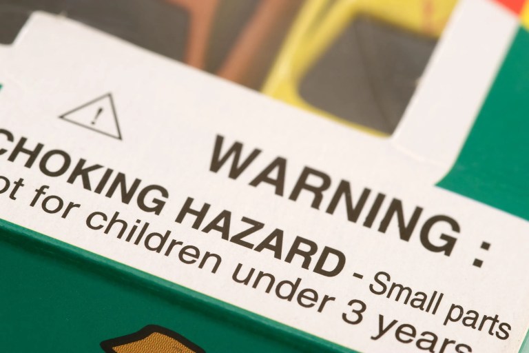 A safety manual for a children's toy that complies to ANSI Z535.6‑2023 specifications for collateral materials, which details warnings of a choking hazard for young children.