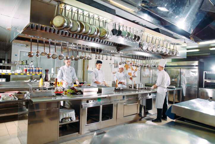 Food safety audit in a kitchen to ensure quality food management system that adheres to ISO 22003-1:2022.