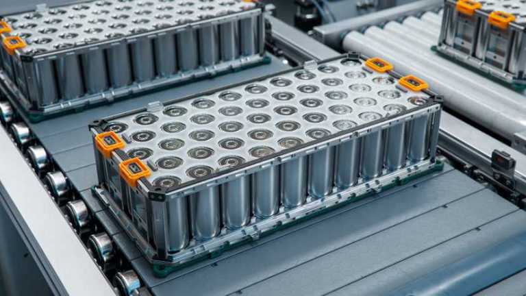 Lithium ion battery being manufactured in pack on assembly line.