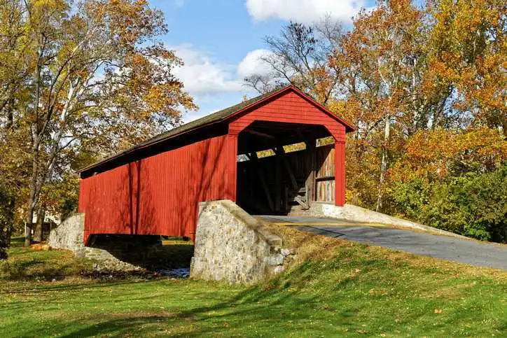 Pool Forge covered bridge in Fall, Lancaster County, Pennsylvania, USA.