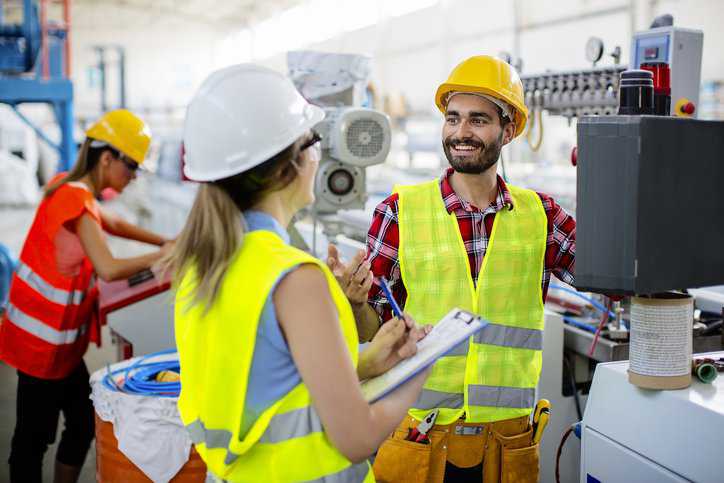 Assessor conducting conformity assessment that adheres to ANSI/ISEA 125-2014 to assure PPE is safe and compliant to the standard.