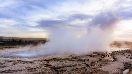 Water vapor coming from a geyser, contributing to climate change and the greenhouse gas effect.