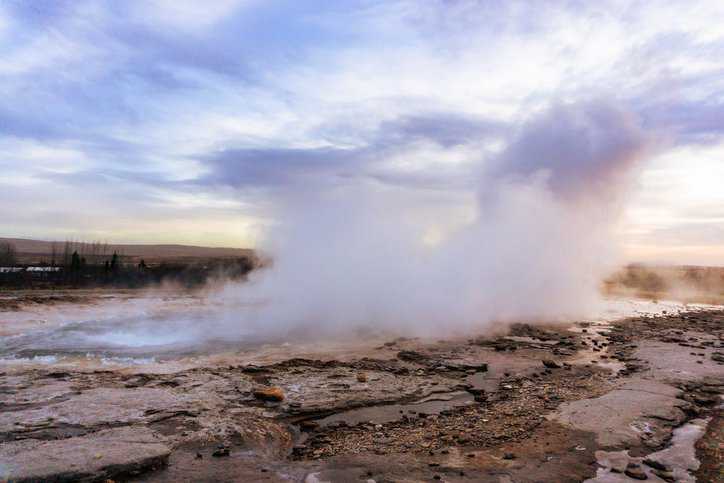 Water vapor coming from a geyser, contributing to climate change and the greenhouse gas effect.