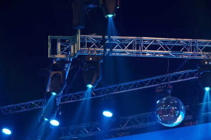 Aluminum light truss above the stage for a concert that adheres to ANSI E1.2-2021.