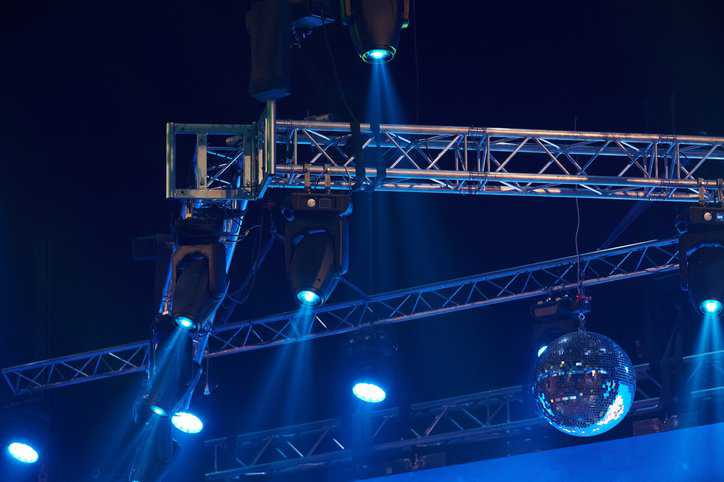 Aluminum light truss above the stage for a concert that adheres to ANSI E1.2-2021.