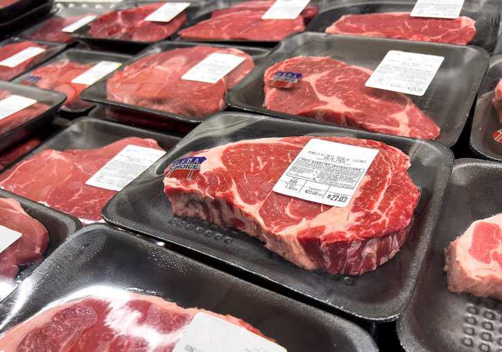 USDA Choice Beef Rib Eye Steaks for sale at a supermarket with market claims adhering to ASTM F2925-11(2018).