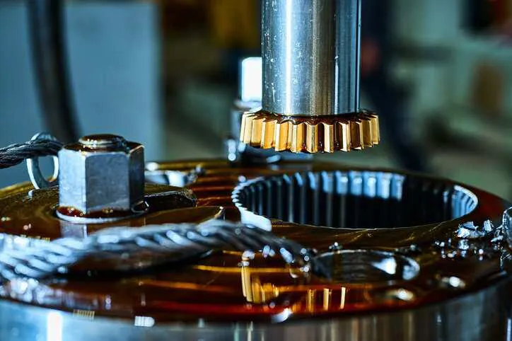 Manufacturer using the radial composite (double flank) method to test cylindrical gears, while adhering to AGMA 915-2-B20 (R2025).