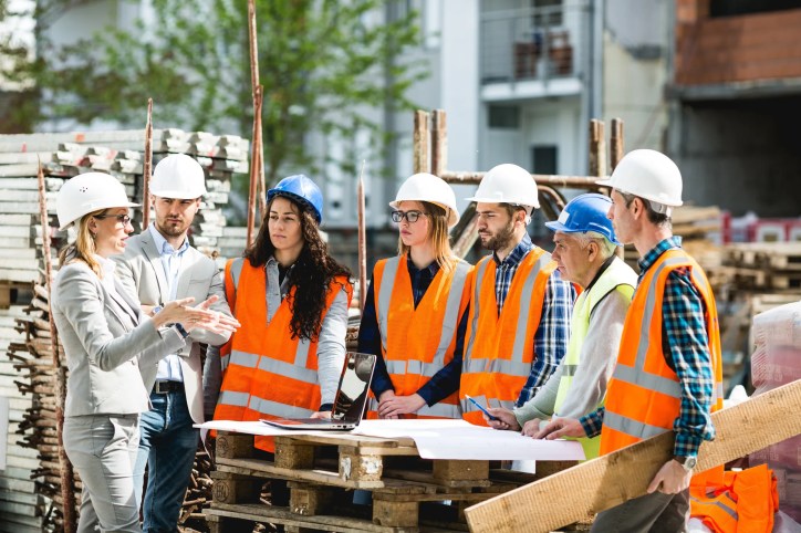 Construction workers using precision and bias statements that adhere to ASTM C670-24ae1.