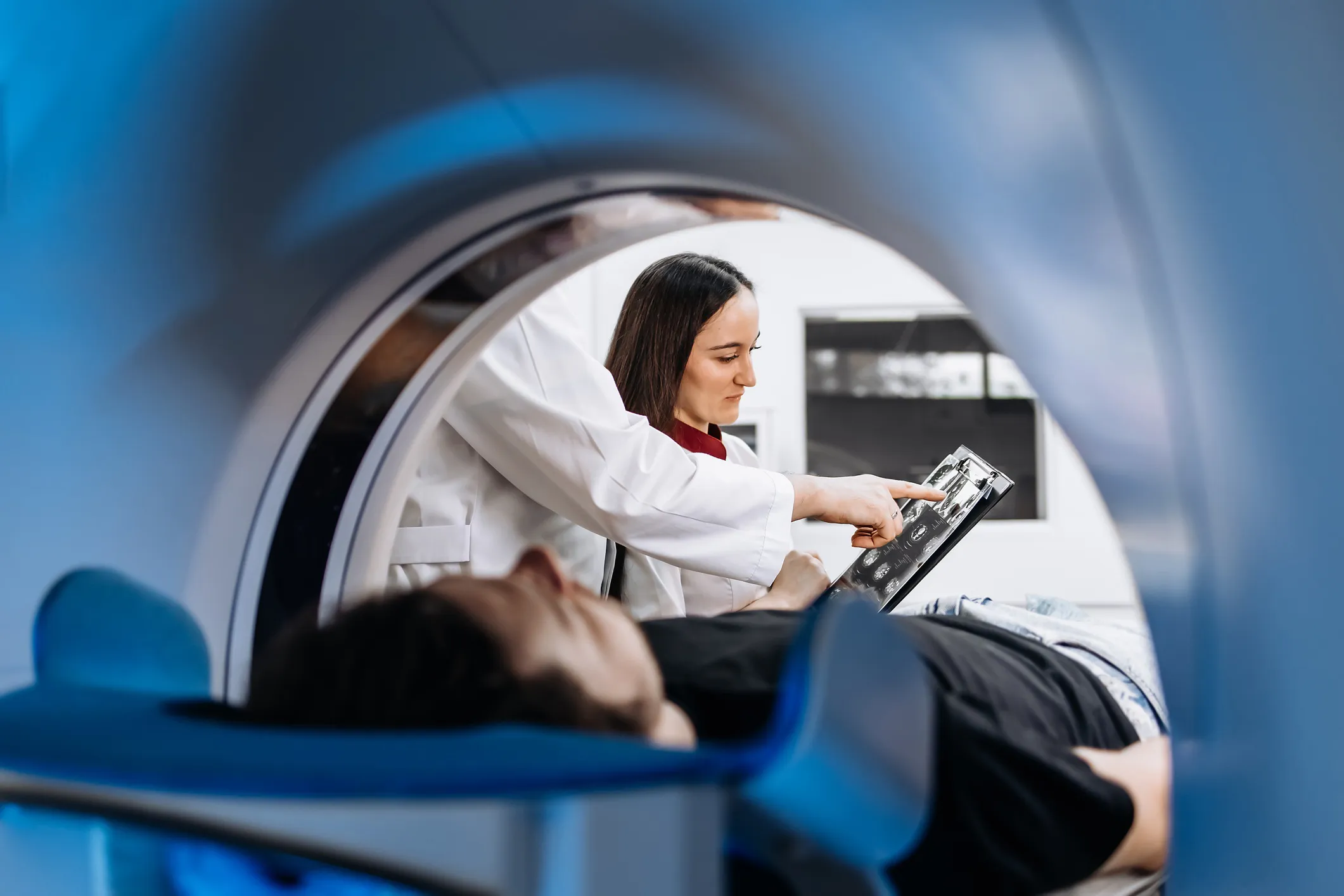 Patient in a MRI machine that adheres to ASTM standards for MRI safety.