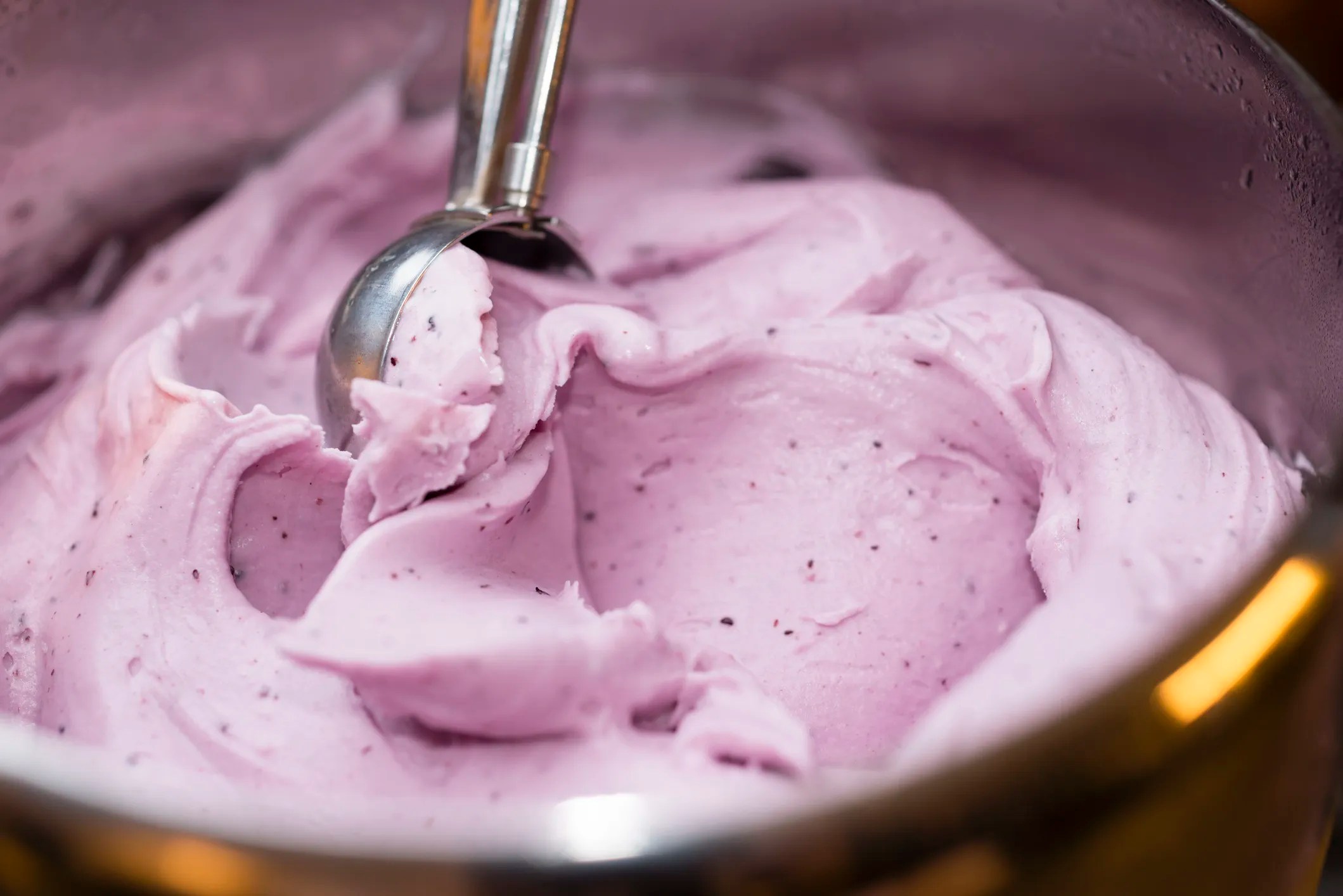 Strawberry gelato that has the perfect creamy texture due to the use of ice cream stabilizers and emulsifiers.