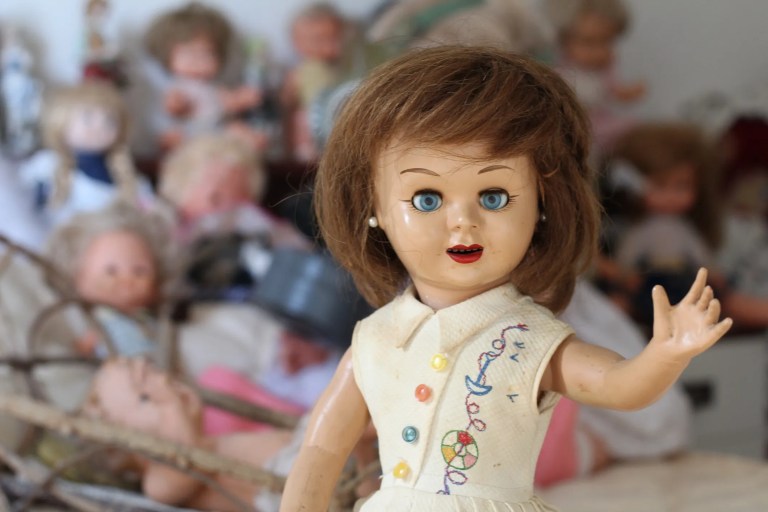Creepy, scary doll used as a prop for a Halloween, horror movie while adhering to ASTM F963-23 toy safety guidelines.