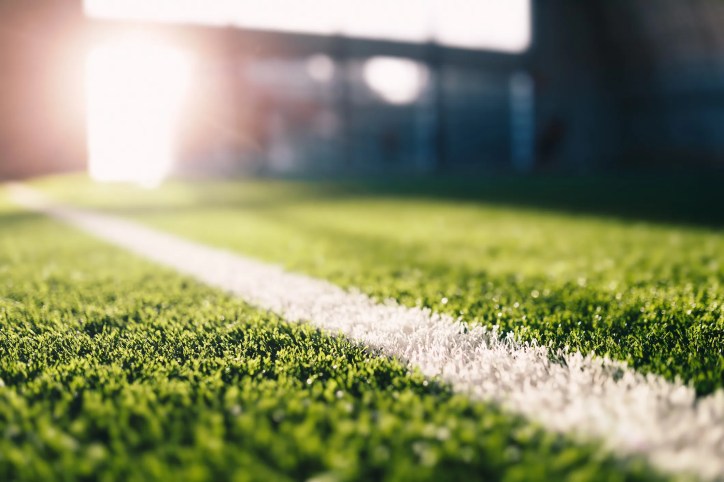ASTM testing of sports playing surfaces to evaluate impact attenuation, abrasiveness, and athlete safety on synthetic turf and natural grass fields.