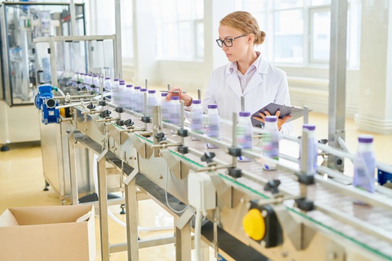 Quality control inspection in a manufacturing facility using ISO 2859-1:2026 AQL sampling procedures for lot-by-lot acceptance.