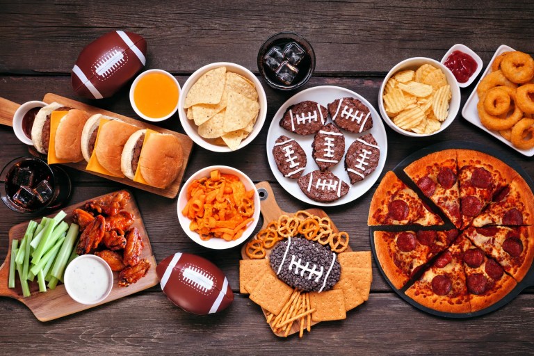 ISO standards assuring food safety, traceability, and quality for Super Bowl snacks, including ISO 22000, ISO 22005, ISO 14001, and ISO 9001, to guarantee safe, high-quality, and sustainable food products during the big game.