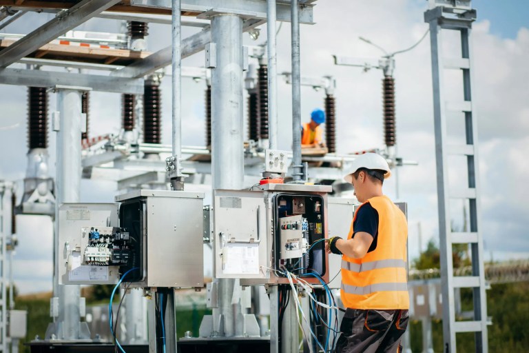 Installation of modern electrical station adhering to ANSI C12.22-2026 guidelines for interfacing to data communication networks.