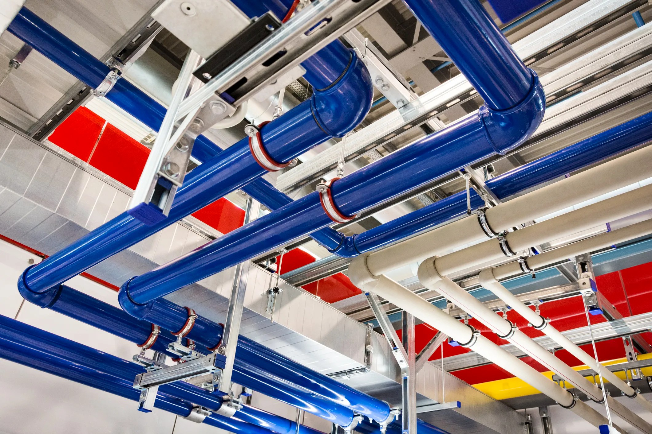 Plastic piping system components including PVC, CPVC, and PEX pipes used in water distribution and drainage systems, aligned with NSF/ANSI 14-2025 standards for safety and performance.