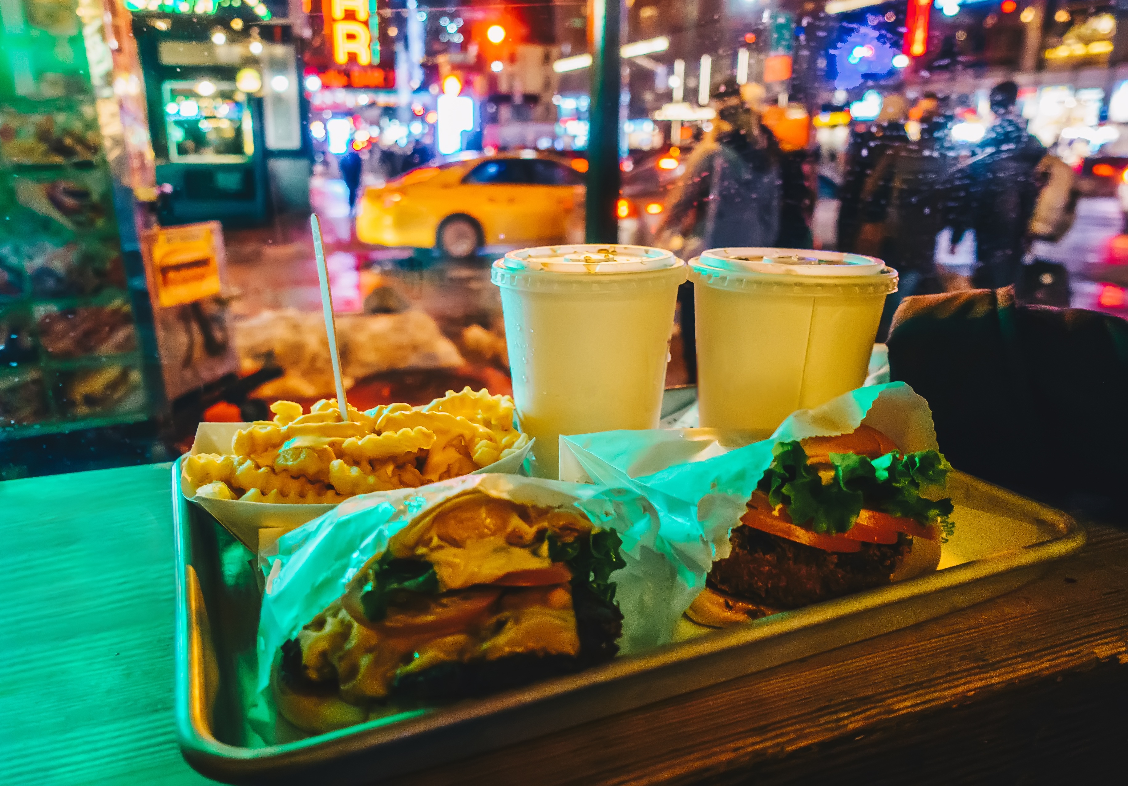 Standard American Diet showcasing a burger paired with fries and soda and hance ultra-processed food.