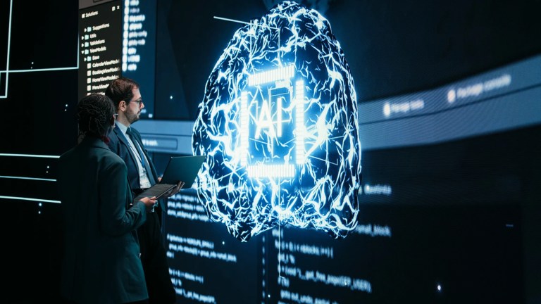 Two technology professionals evaluating AI system data on interactive screens, highlighting artificial intelligence standards, transparency, and risk management.