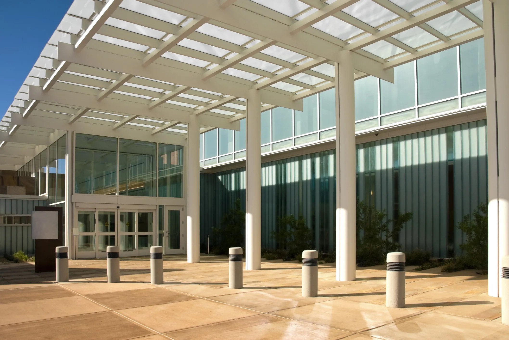 Commercial building with high-performance windows and skylights illustrating energy-efficient fenestration designed to withstand weather and improve occupant comfort.