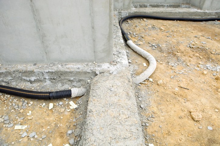 ANSI/AARST SGM-SF-2023 soil gas mitigation system reducing radon and hazardous soil gases entering an existing home.
