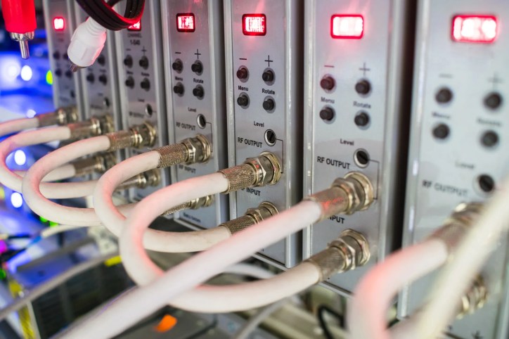 AVIXA RP-C303.01:2018 networked audiovisual system with displays, cameras, microphones, and presentation equipment connected to a secure network.