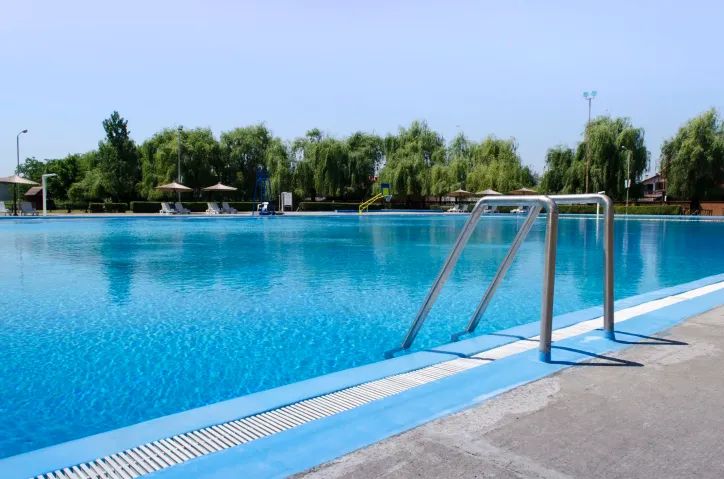 Public swimming pool illustrating the water quality, safety, and maintenance practices addressed in ANSI/PHTA/ICC-2-2023, Public Pool and Spa Operations and Maintenance.