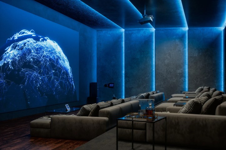 Home theater with immersive audio speakers, designed according to CEDIA-CTA-RP22-2023 recommended practice.